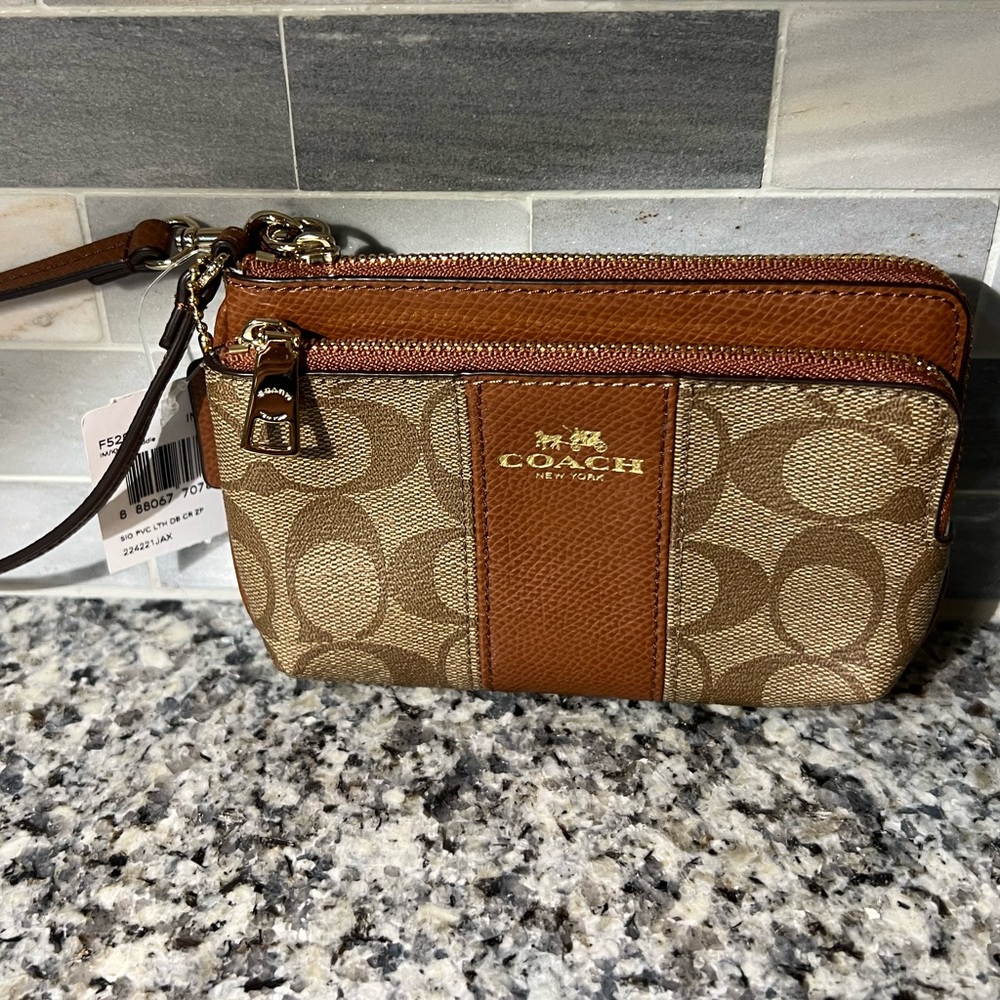 Coach brown monogram wristlet/wallet